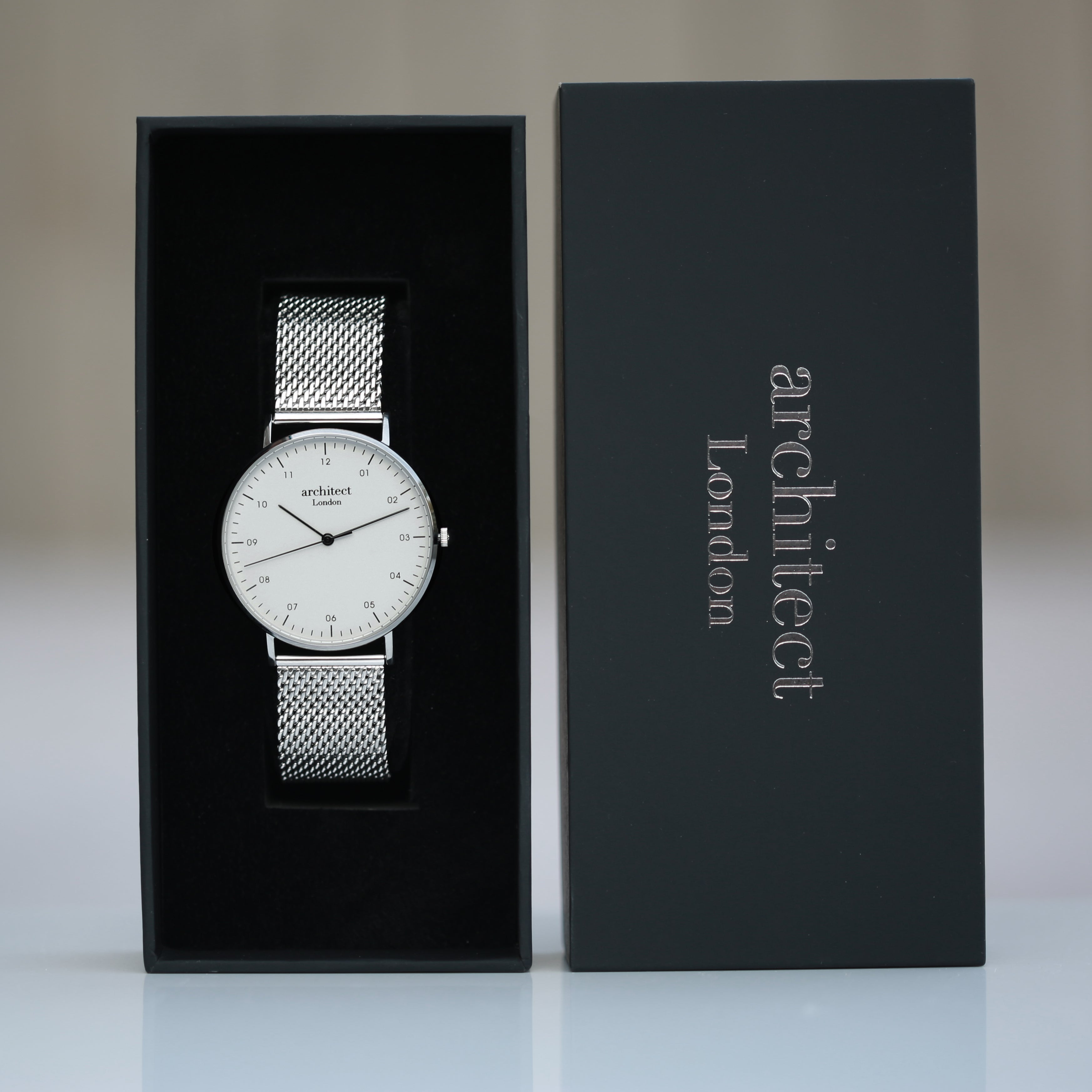 silver minimalist mens engraved watch in luxury architect london box