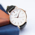 Personalised ladies rose gold Blanc watch with black leather strap in lifestyle setting
