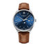 Watch with brown leather strap and blue dial on a white background