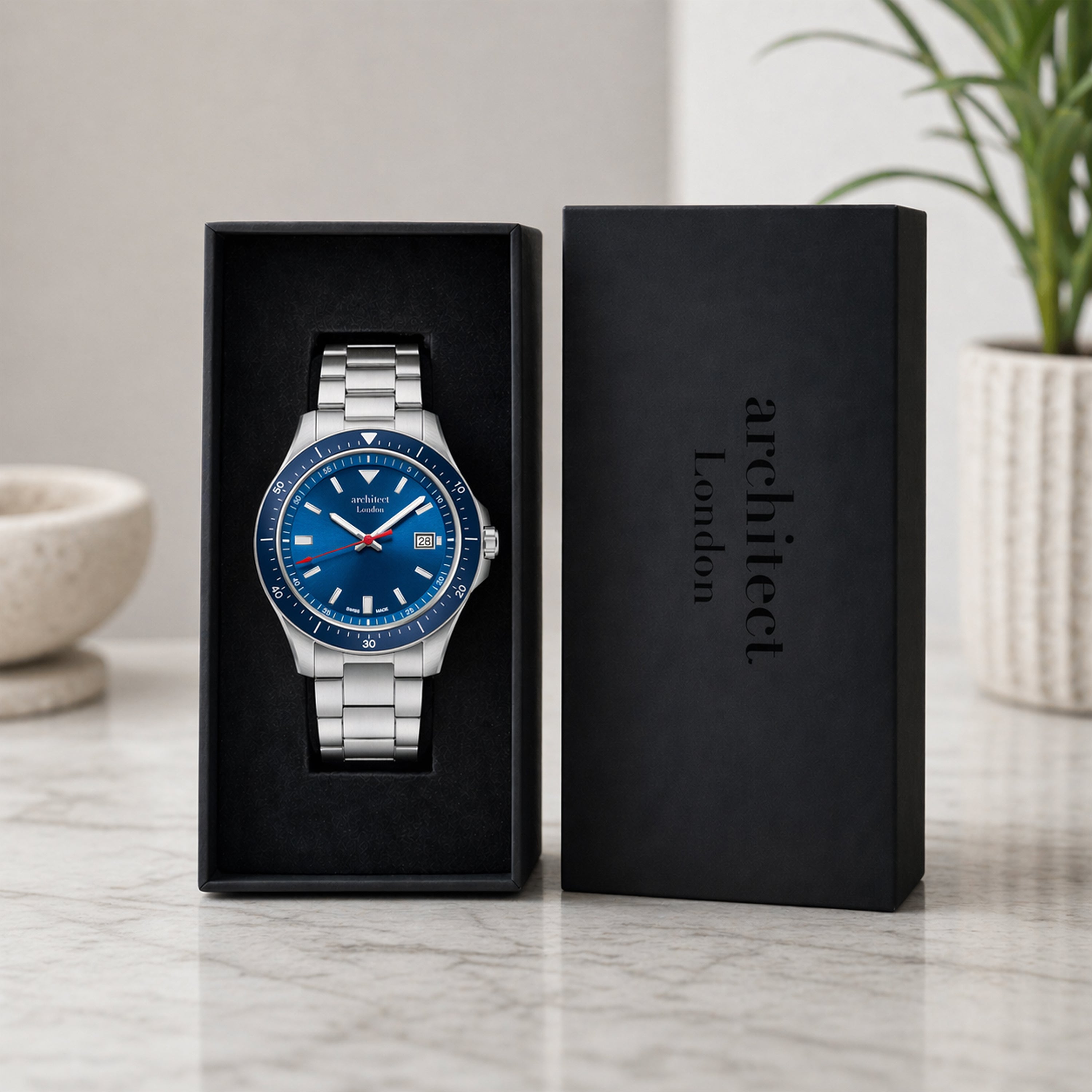 Swiss watch with blue dial in luxury watch box
