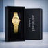 Gold watch in a black box with 'architect London' branding on a gray background