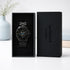 Black wristwatch in a box with 'Architect London' branding on a light background