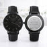 mens personalised watch showing engraving. Black face watch and black leather strap