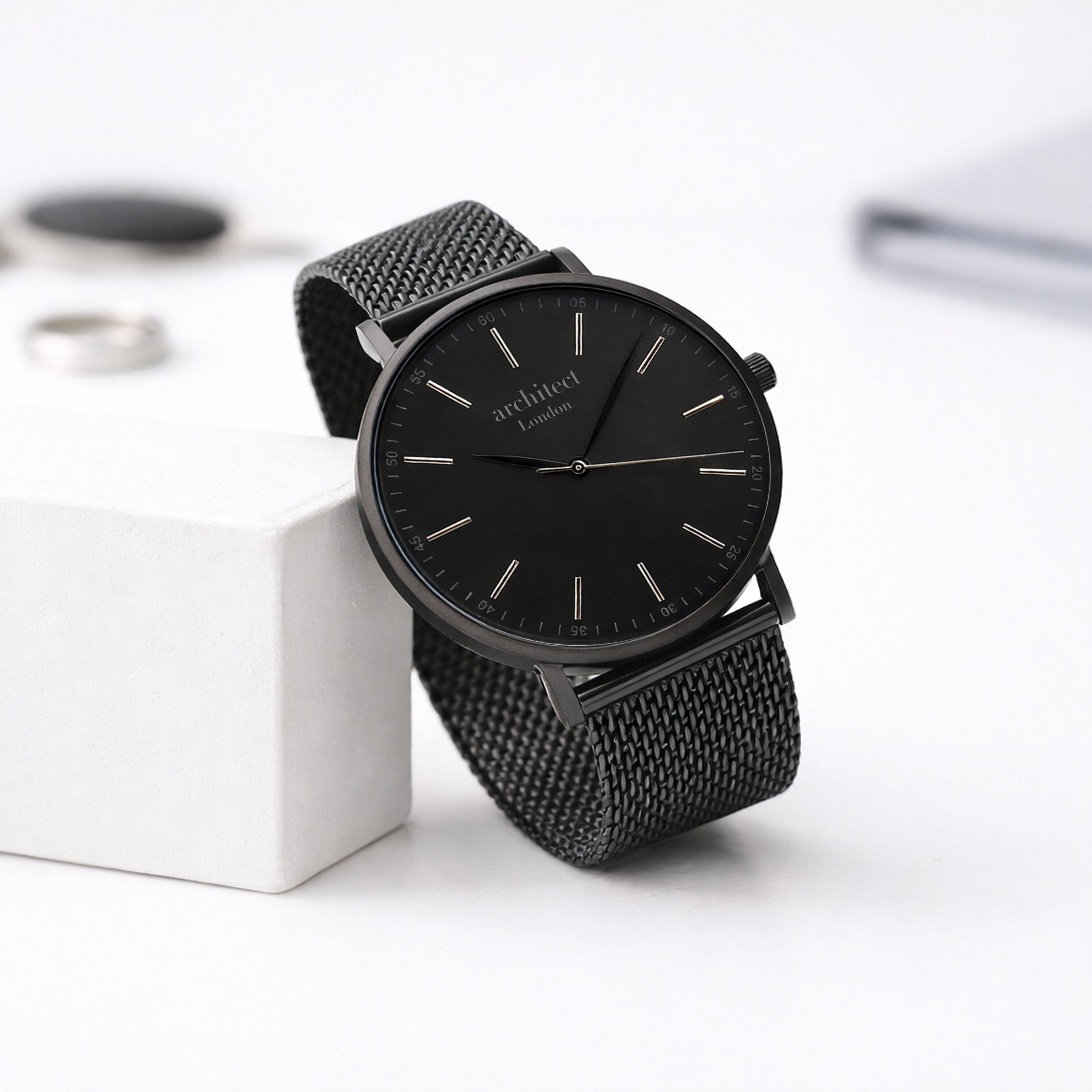 Personalised Black watch with mesh strap on a white background