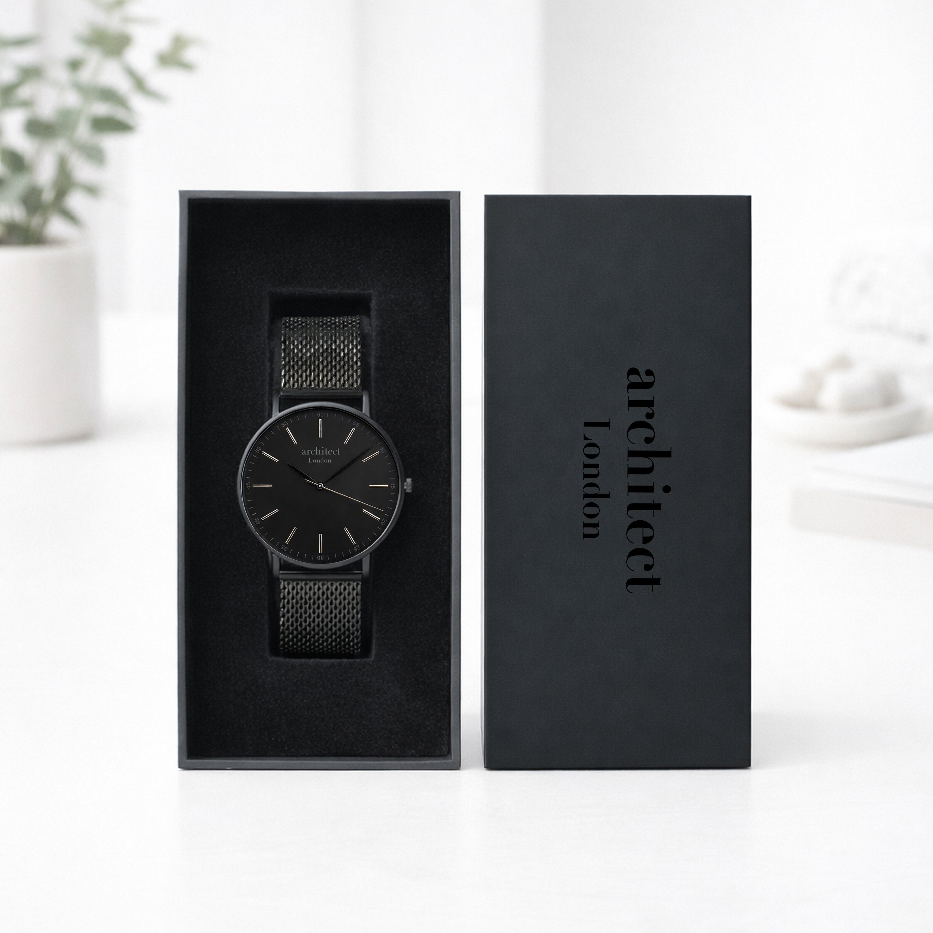 Black watch in a box with 'architect London' branding on a white background