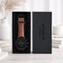 Watch with brown leather strap in a black box labeled 'architect London' on a light background.