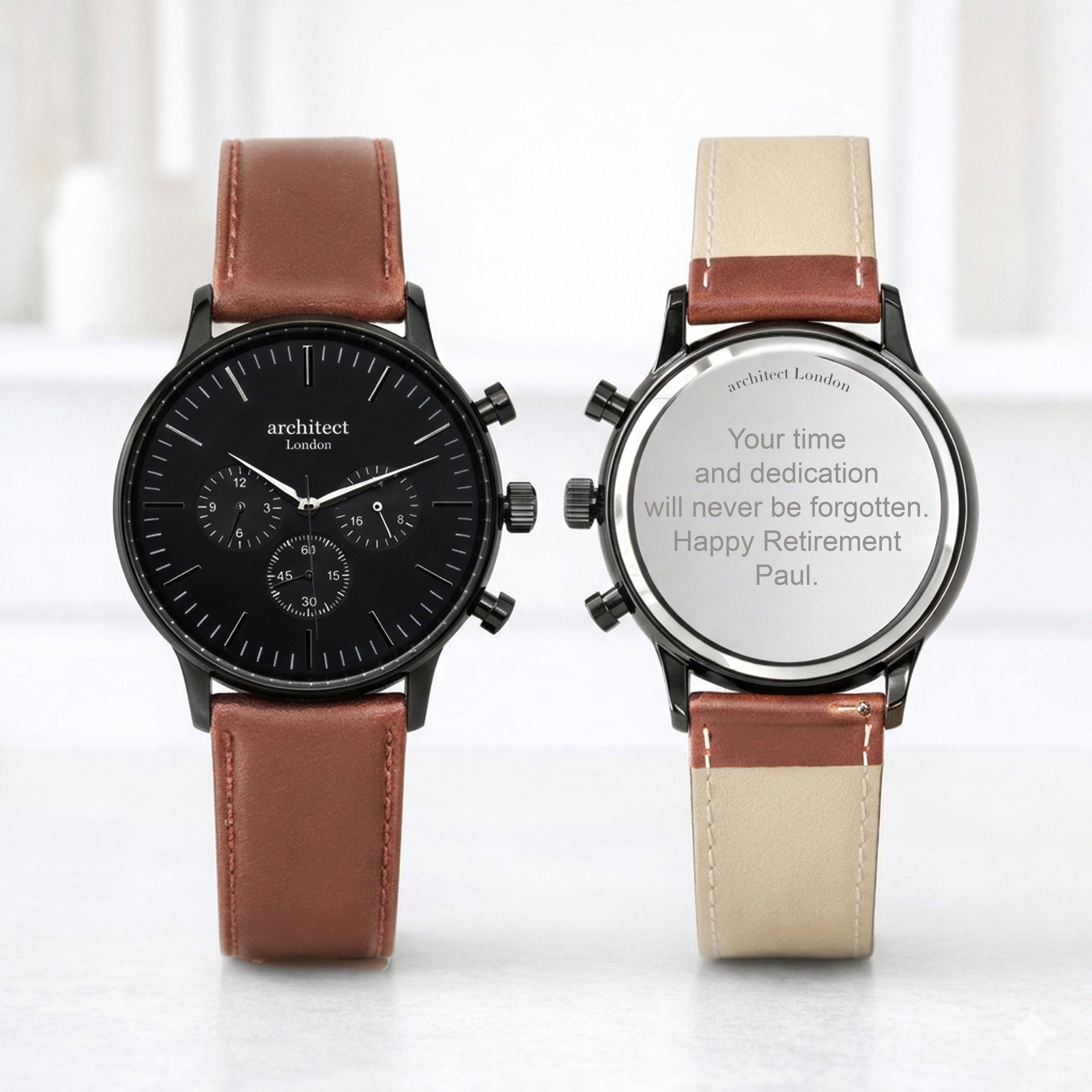 Two watches with brown and beige leather straps on a white background - engraved watch