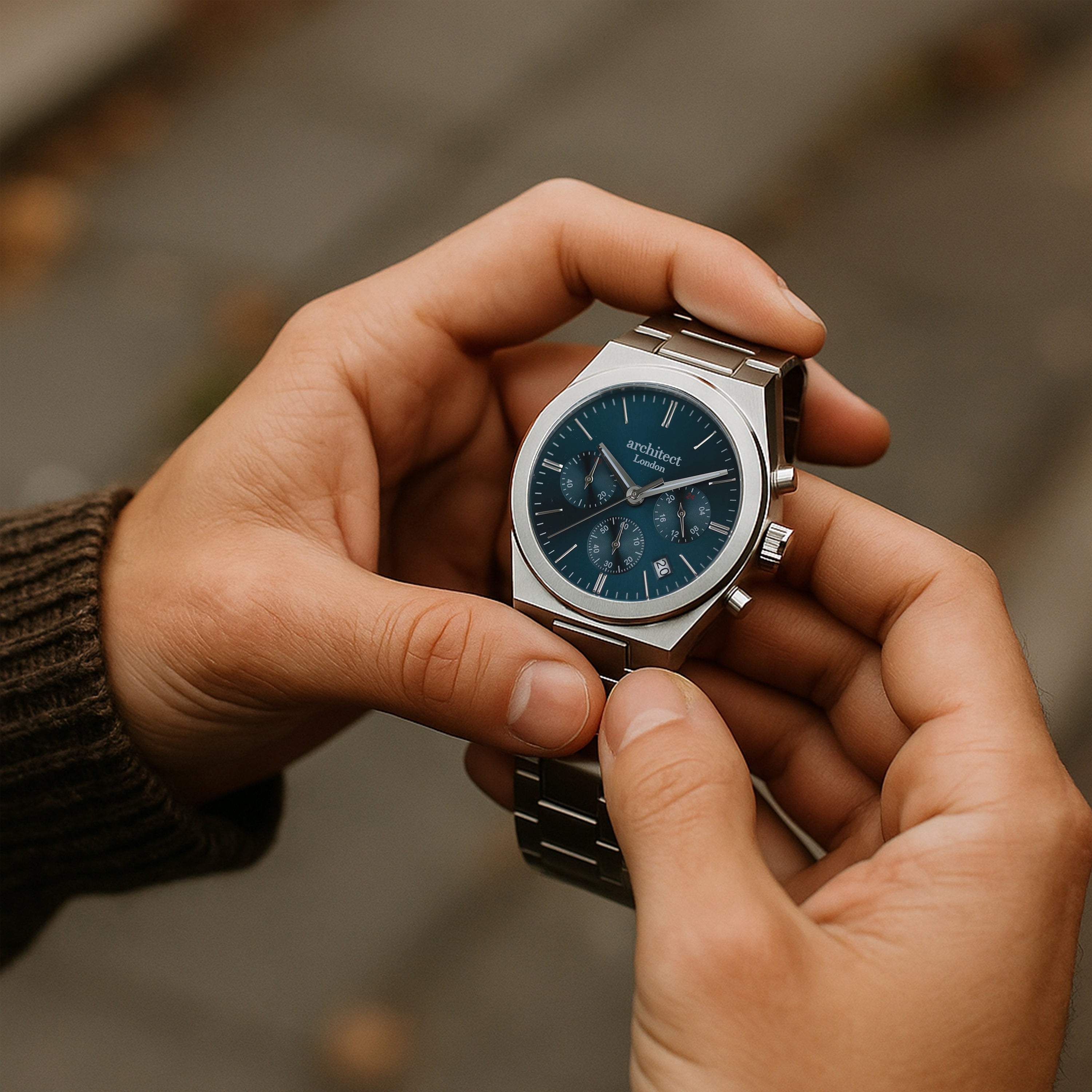 Close-up of blue chronograph dial with three subdials – Orbix
