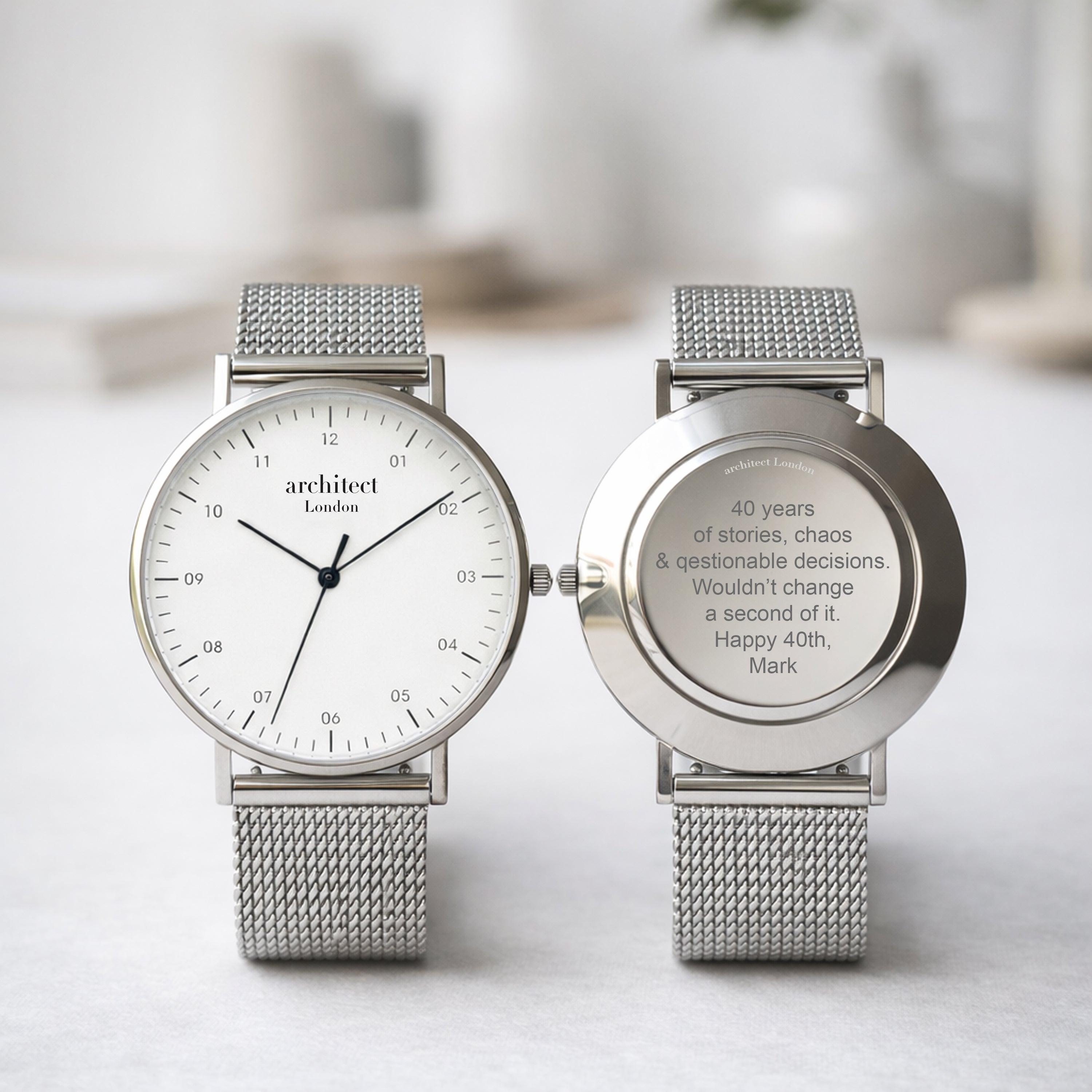 Minimalist engraved watches one showing engraving at the back